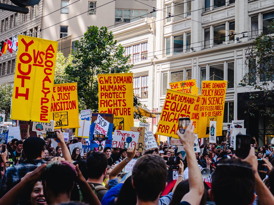 Image of a community rally advocating for immigrant rights